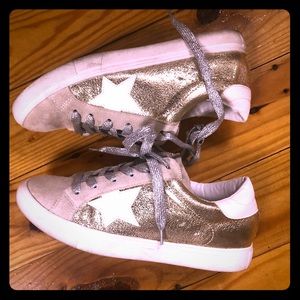 Gold and silver sneakers